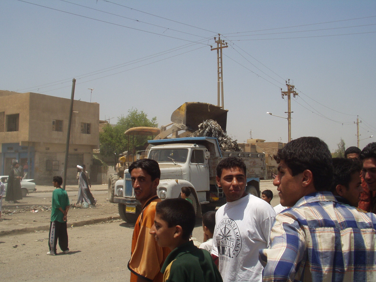 Clearing trash and debris during the Thawra cleanup