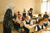 A teacher makes a point during class at the Agadir Secondary  Girl's school in the Saydiya neighborhood of Baghdad. Several rooms of the school were looted during the war. USAID is looking at refurbishing the school.