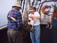 mbrose Jearld and Suzanne Renssalaer prepare to deploy a Shipek grab sampler.