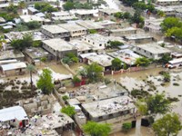 Tropical Storm Jeanne inundates homes in Gonaives, Haiti.