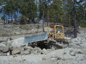 Picture depicting construction to reinforce the main avenue in the CARITAS project. Photo Source: OTI Staff