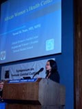 Photo of Dr. Nawal Nour at the FGC Symposium (National Press Club) presenting on the African Women's Center and its work with immigrant women, the majority of which come from Sudan, Somalia and Ethiopia.