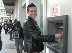 Photo of woman at an ATM in Bosnia.