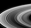 This view looks down onto the unlit side of Saturn's ringplane. It nicely shows a near-arm/far-arm brightness asymmetry in the B ring: The near arm of the B ring is notably darker from this viewing geometry than is the far arm