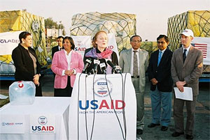 Photo - From Left: Denise Rollins, USAID Misson Director; Geeta Pasi, U.S. Charge D’affaires;  Dr. Md. Ayub Miah, Secretary, Ministry of Food and Disaster Management,  Shahidul Islam, Director General of Americas Desk, Ministry of Foreign Affairs and Christopher Lafargue, Education Team Leader, USAID Bangladesh -- Photo Credit: USAID/Sue McIntyre