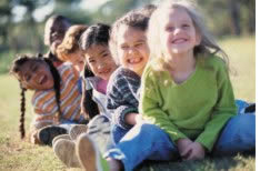 Picture of children playing, exemplifying one of the many populations that EPA must consider when writing regulations. Executive Order 13045 directs all Federal agencies to consider children's health.