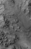 This MOC image shows dried streambeds -- martian gullies -- in the mountainous central peak region of Hale Crater
