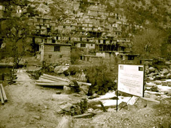 Photo: The signboard proclaiming the Nuristan water project.