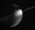 In this magnificent view, delicate haze layers high in the atmosphere 
encircle the oblate figure of Saturn. A special combination of spectral 
filters used for this image makes the high haze become visible
