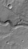 This MOC image shows narrow channel on the upper east flank of the martian volcano, Hadriaca Patera. Located on a volcano, most likely this channel was formed by lava, perhaps as a lava tube at which the thin roof later collapsed