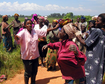 Photo: Abaniki members dance in the field.