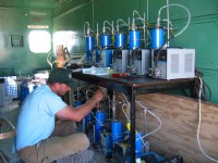 On-site facility for collection of soil-water vapor and unsaturated-zone gas from a deep borehole for tritium and volatile-organic compound analyses. USGS scientists are conducting research on the transport and fate of tritium and other contaminants in desert environments with thick unsaturated zones