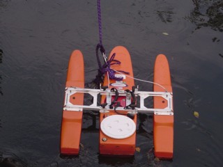 USGS personnel demonstrate water-quality sampling equipment.