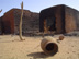 Photo: Burned shops in an Abandoned Village between Geneina and Sisi