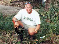 Mike Beckwith holds a weighted tape measure called a Nubian tape