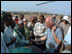 Administrator Natsios shakes hands with village elders, including the village chief, at a supplementary food distribution site in Halidege run by GOAL. The elders, including the chief, thanked him for the generous support.