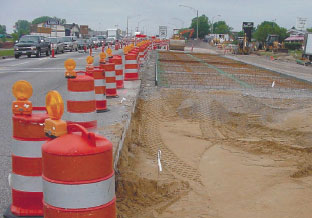 M-11 Facing West, east approach, with traffic cones and rebar construction