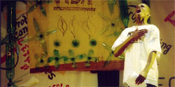 Photo: Gilson Assis performs in a play about HIV/AIDS prevention in a program through the USAID-funded Adolescents' Integral Reference Center in Salvador.