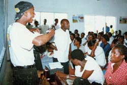 Photo of a education team in a secondary school in Malawi.