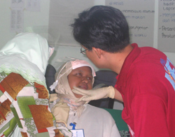 Photo of women participating in first-responder training in Indonesian.