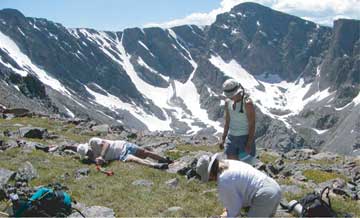 Photo of scientists working in the mountains
