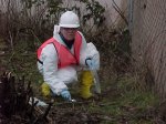 image START contractor collecting soil sample from are LRR1 north of site.