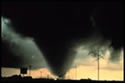 Tornado ripping through a field