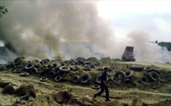 Photo: Burning pile of tires