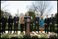 President George W. Bush, joined by the council members from the President's Council on Physical Fitness and Sports, announces the start of the National President's Challenge Thursday, March 20, 2008 in the East Garden at the White House. The National President's Challenge is a six-week physical activity challenge designed to get America up and moving 30 minutes a day, five days a week. White House photo by Joyce N. Boghosian