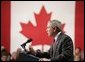 President George W. Bush delivers a speech at Pier 21, Canada's celebrated point of immigration and military deployment, in Halifax, Canada, Dec. 1, 2004. "I'm proud to stand in this historic place, which has welcomed home so many Canadians who defended liberty overseas, and which so many new Canadians began their North American dream," said the President. White House photo by Paul Morse