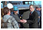 President George W. Bush talks with workers at the Port of New Orleans, Tuesday, Jan. 15, 2002. White House photo by Eric Draper.