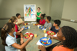 Dietitian shares nutrition information with middle-school students: Click here for full photo caption.