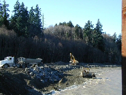 image - dump truck near sandy shore