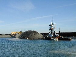 image - large barge with sand pile