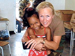 Jensen poses with Stephani, a Suriname girl who spoke English.