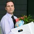 Businessman holding box of belongings (© A J James/Getty Images)