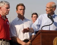 Mark Everson, American Red Cross, Governor Schwarzenegger, California, and Secretary Chertoff discuss status of the response to the fires on Tuesday. (Photo USCG)