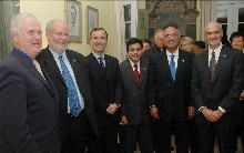Homeland Security Secretary Michael Chertoff, Houston Councilman Masrur Khan, Attorney General Alberto Gonzales, European Commission Vice President Franco Frattini, Home Secretary of the United Kingdom Charles Clarke and European Union Ambassador to the U.S. John Bruton (right to left) participating in an iftar (“breaking the fast”) October 6, 2005, to celebrate Ramadan with members of the Muslim community during the U.S. – EU Justice and Home Affairs Ministerial Troika.  (DHS Photo/Barry Bahler)