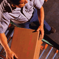worker moving box from conveyor belt
