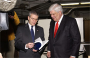 Public Printer Bruce James and Office of Management and Budget Director Joshua Bolten examine the 2006 Federal Budget in GPO’s Bindery Section.