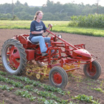 girl on tractor