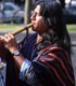 American Indian Gentleman Playing Flute