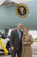 President George W. Bush presented the President’s Volunteer Service Award to Cindy Leep upon arrival in Grand Rapids, Michigan, on Wednesday, October 15, 2008.  Leep is a volunteer with Uganda Amaranth Project for Partners Worldwide. To thank them for making a difference in the lives of others, President Bush honors a local volunteer when he travels throughout the United States.  He has met with more than 650 volunteers, like Leep, since March 2002.