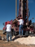 Water well drilling rig.