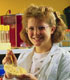 A Middle School Student Works on Her Science Fair Project