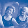 Image of elderly women are doing exercise in swimming pool.