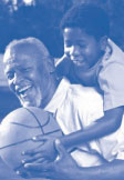 Image of an elderly man is playing basketball with his grandson.