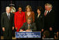 President George W. Bush signs transmittal papers for the Colombian Free Trade Agreement Monday, April 7, 2008, in Dwight D. Eisenhower Executive Office Building. President Bush is joined by, left to right, Secretary Bob Gates, Department of Defense; Secretary Condoleezza Rice, Department of State; Ambassador Susan Schwab, United States Trade Representative; Secretary Elaine Chao, Department of Labor; Director John Walters, Office of National Drug Control Policy; and Secretary Ed Schafer, Department of Agriculture. White House photo by Joyce N. Boghosian