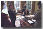 President Bush directs discussions of the State of the Union speech with senior White House staff members Andy Card, Karen Hughes and Dr. Condoleezza Rice in the Oval Office Thursday, January 24. White House photo by Eric Draper.