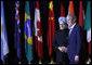 President George W. Bush welcomes Prime Minister Manmohan Singh of India, to the Summit on Financial Markets and the World Economy Saturday, Nov. 15, 2008, at the National Building Museum in Washington, D.C. White House photo by Eric Draper